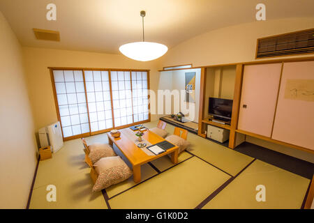 Inside a Japanese styled room with table and chairs Stock Photo