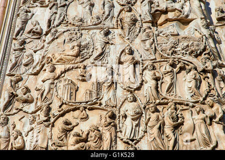 Bas-relief sculpture panel with scenes from the Bible by Maitani, 14th century Tuscan Gothic, Cathedral of Orvieto, Umbria Italy Stock Photo