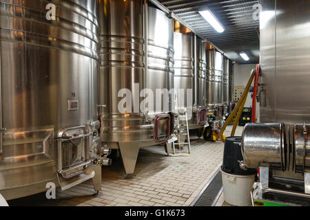 Stainless steel fermentation tanks for Cabernet wine, Wine Estate Chateau Carignan, Carignan de Bordeaux, France. Stock Photo