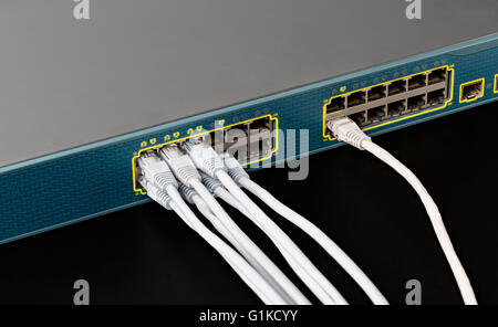 Smart lan switch with 24 ethernet and gbic optical ports Stock Photo