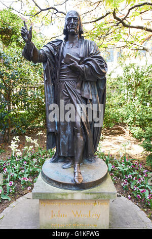 Statue Of John Wesley Founder Of Methodism Sculptured By Samuel Manning St Paul's Cathedral Churchyard London UK Stock Photo