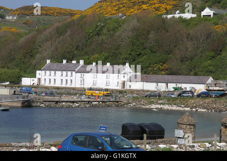 Manor House Rathlin Island and view across the harbour at Church Bay, Rathlin Island, County Antrim, Northern Ireland. Stock Photo