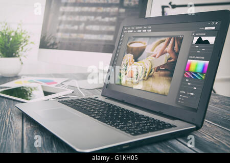 photographer camera editor monitor design laptop photo screen photography - stock image Stock Photo