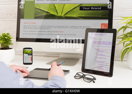 Designer's desk with responsive web design concept. Stock Photo