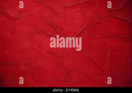 red wall background with decorative plaster place for text Stock Photo