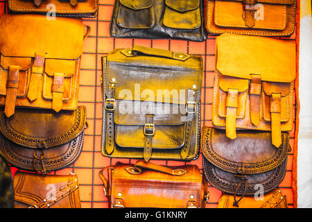 Leather craft stalls in a medieval fair Stock Photo