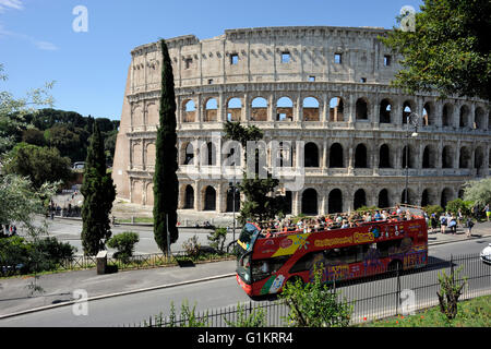 italy, rome, tourist bus and colosseum