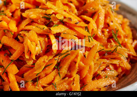 A Russian shredded carrot salad called 'Korean Salad.' It's not part of Korean cuisine at all. Stock Photo