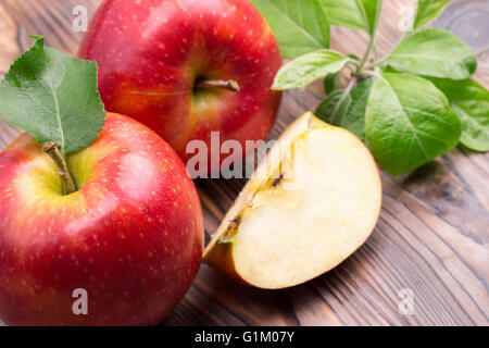 red apples on the wooden background. Stock Photo