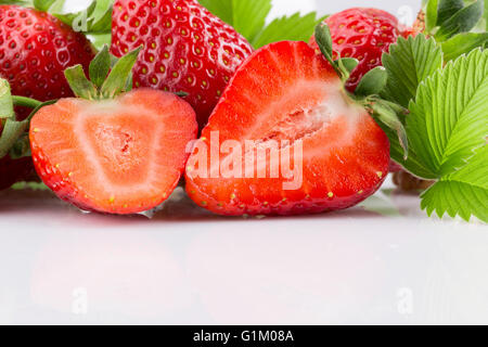 Fresh and tasty strawberries on white background Stock Photo - Alamy