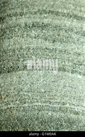 banded green Welsh sandstone pebble Stock Photo