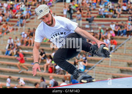 BARCELONA - JUN 28: A professional skater at the Inline skating jumps competition at LKXA Extreme Sports Barcelona. Stock Photo