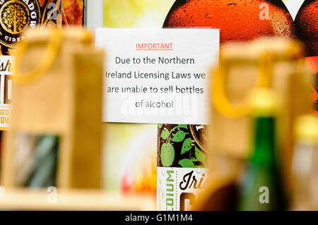 Sign at a food fair saying that because of Northern Ireland Licencing laws, the vendors are unable to sell alcohol. Stock Photo