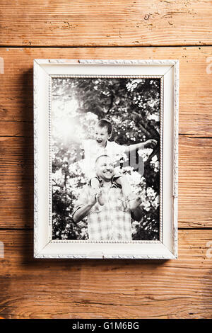 Picture frame on wooden table Stock Photo