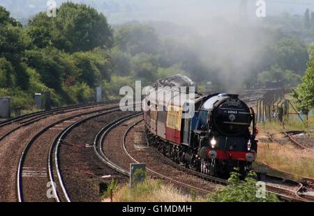 New Build A1 Pacific 60163 Tornado approaching Salfords in a purposeful manner with a Steam Dreams Cathedrals Express from Lewes Stock Photo