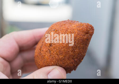 Kibbeh - Middle Eastern meal in hand Stock Photo