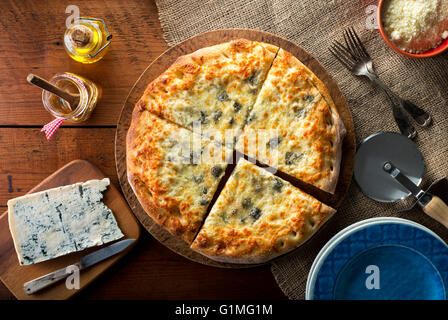 A delicious home made gourmet pizza with gorgonzola blue cheese. Stock Photo