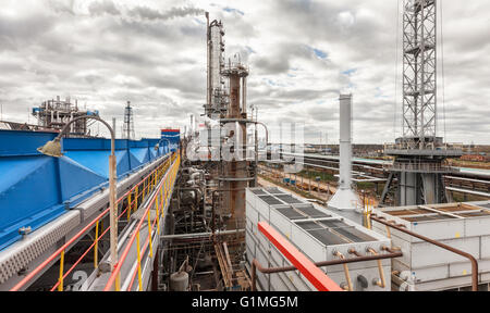 Chemical plant for production of ammonia and nitrogen fertilization on day time. Stock Photo