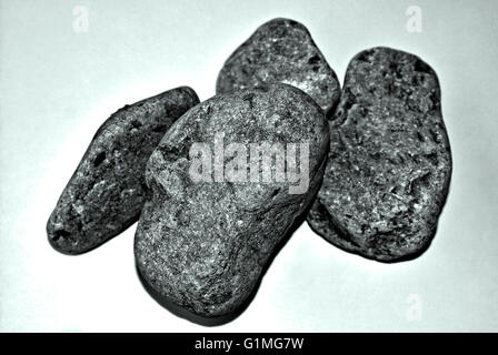 Stone arts, Arrangement four of stones, soft rounded stones in Black and White. Stock Photo
