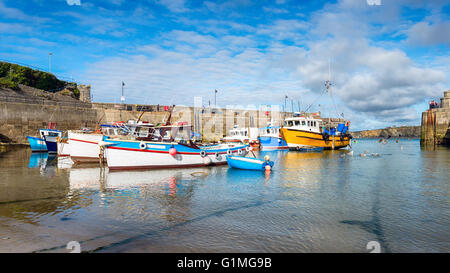 Fishing boats on a sunny afternoon at Newquayon the north coast of Cornwall Stock Photo