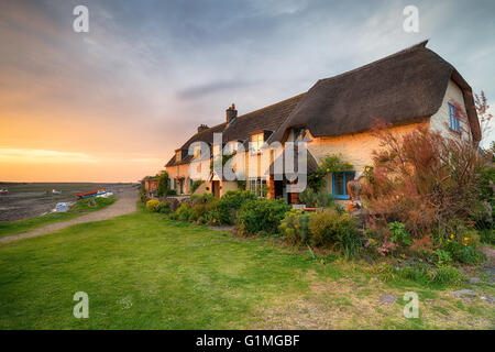 Beautiful cottages at sunset on Porlock Weir in Somerset Stock Photo
