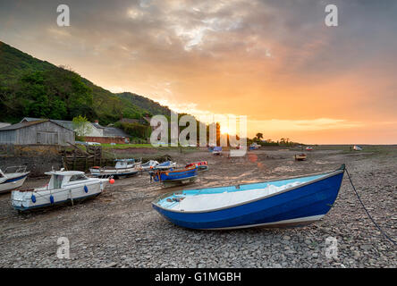 Boats at sunset at Porlok Weir on the Exmoor coast in Somerset Stock Photo