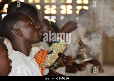 Catholic church, priests or monks praying at an altar of church in Ghana, Bolgatanga, West Africa Stock Photo