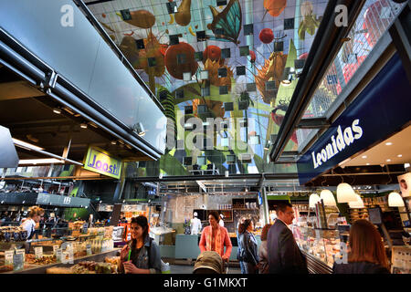 Colourful interior of the Rotterdamse Markthal (Rotterdam Market hall) at the Blaak square Dutch Netherlands Stock Photo