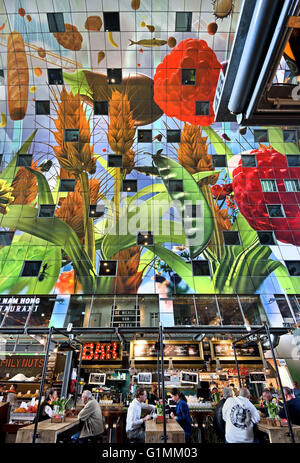 Colourful interior of the Rotterdamse Markthal (Rotterdam Market hall) at the Blaak square Dutch Netherlands Stock Photo