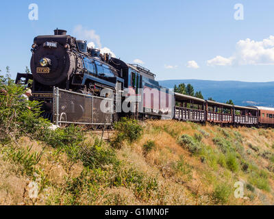 1912 steam locomotive 3716, 'Spirit of Summerland, pulls a train on the Kettle Valley Steam Railway, near Summerland BC Canada. Stock Photo