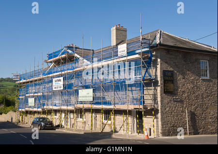 The Swan Hotel at Hay-on-Wye Powys Wales UK. A Georgian Grade II listed building covered in scaffolding while undergoing extensive refurbishment. Stock Photo