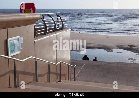 People taking a rest on Blackpool's sea front. Stock Photo