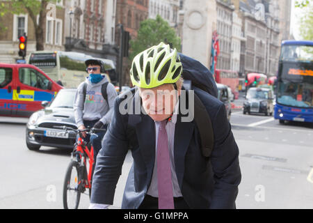 Boris Johnson cycling along Whitehall Stock Photo