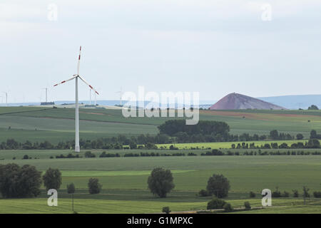 View from castle ruin Schweinsburg in Bornstedt, Saxony-Anhalt, Germany on agricultural landscape with wind power stations and s Stock Photo