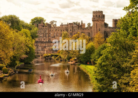 Medieval British castles and buildings; view of the 12th century Warwick Castle and the River Avon, Warwick, Warwickshire, England UK Stock Photo