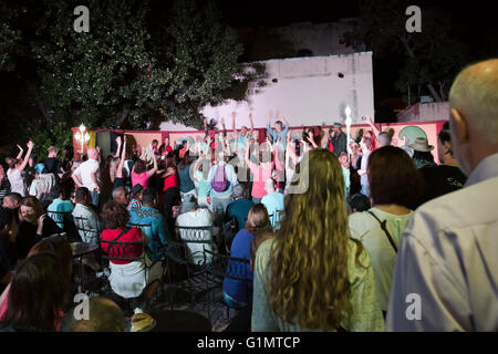 Horizontal view of people dancing to a salsa group at Casa de la Musica in Trinidad, Cuba. Stock Photo