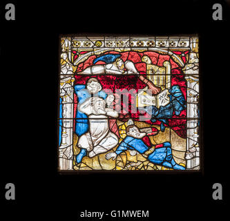 One of the117 story panels in the medieval century stained glass window at the east end of York Minster (cathedral), England. Stock Photo