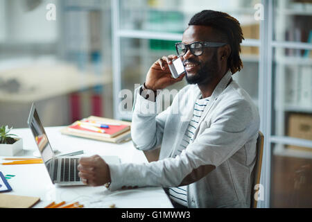 Happy man on the phone Stock Photo