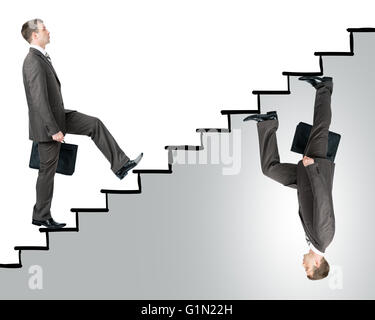 Two business men walking up stairs Stock Photo
