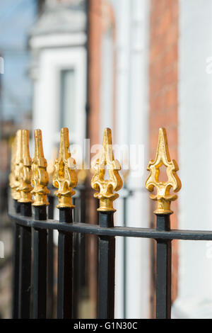 Gold painted spiked house railings in Stratford Upon Avon, Warwickshire, England Stock Photo