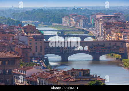 Florence, Florence Province, Tuscany, Italy.  View from Piazzale Michelangelo to bridges across Arno river. Stock Photo