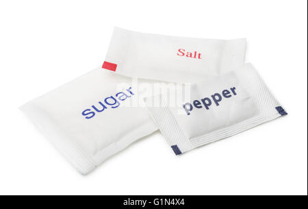 Sugar, salt and pepper sachets isolated on white Stock Photo