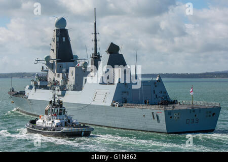The British Royal Navy warship HMS Dauntless (D33) a Type 45 destroyer, departing Portsmouth, UK on the 6th May 2014. Stock Photo