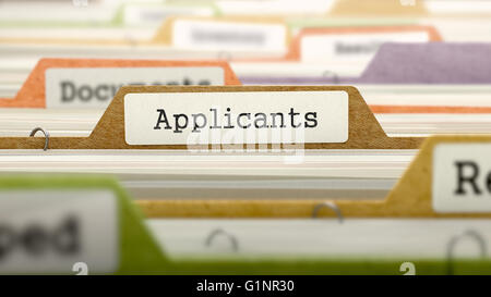 Applicants Concept. Folders in Catalog. Stock Photo