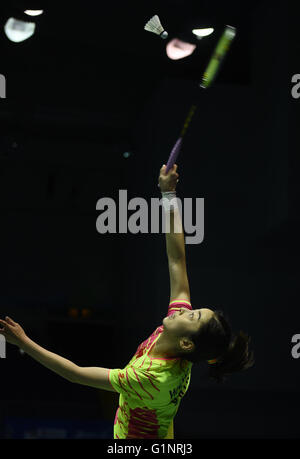 Kunshan, China's Jiangsu Province. 17th May, 2016. Wang Shixian of China competes during the women's singles match against Carolina Marin of Spain in the Group A match at the Uber Cup badminton championship in Kunshan, east China's Jiangsu Province, May 17, 2016. Wang Shixian won 2-1. © Han Yuqing/Xinhua/Alamy Live News Stock Photo