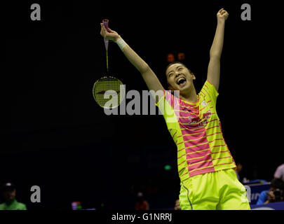 Kunshan, China's Jiangsu Province. 17th May, 2016. Wang Shixian of China celebrates victory after the women's singles match against Carolina Marin of Spain in the Group A match at the Uber Cup badminton championship in Kunshan, east China's Jiangsu Province, May 17, 2016. Wang Shixian won 2-1. © Ji Chunpeng/Xinhua/Alamy Live News Stock Photo