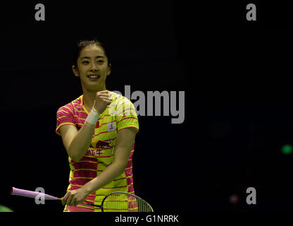 Kunshan, China's Jiangsu Province. 17th May, 2016. Wang Shixian of China celebrates victory after the women's singles match against Carolina Marin of Spain in the Group A match at the Uber Cup badminton championship in Kunshan, east China's Jiangsu Province, May 17, 2016. Wang Shixian won 2-1. © Ji Chunpeng/Xinhua/Alamy Live News Stock Photo