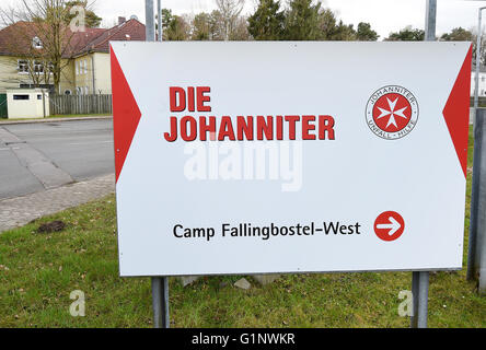 Bad Fallingbostel, Germany. 30th Mar, 2016. A sign reading 'Die Johanniter Camp Fallingbostel West' marking the entrance of a refugee shelter in Bad Fallingbostel, Germany, 30 March 2016. PHOTO: HOLGER HOLLEMANN/dpa/Alamy Live News Stock Photo