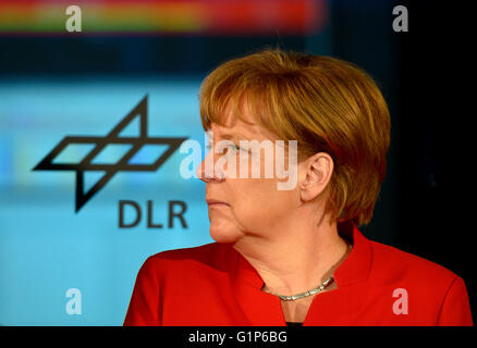 Cologne, Germany. 18th May, 2016. German Chancellor Angela Merkel smiles during a visit to the European Astronauts Center (EAC) of the European Space Ageny (ESA) in Cologne, Germany, on May 18, 2016. Photo: Sascha Schuermann/dpa/Alamy Live News Stock Photo