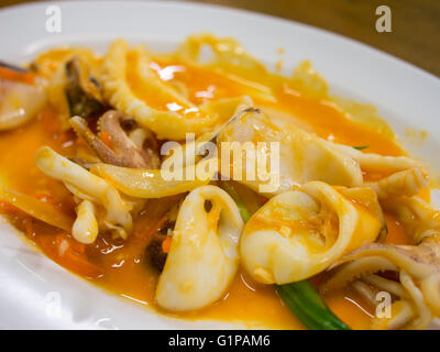 stir fried squid with salted egg yolk Stock Photo